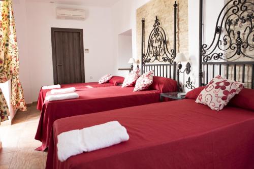 Cama o camas de una habitación en Hostal Palacio del Corregidor