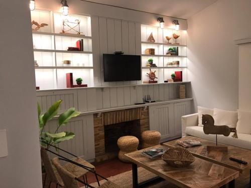 TV a/nebo společenská místnost v ubytování bungalow hotel dollar