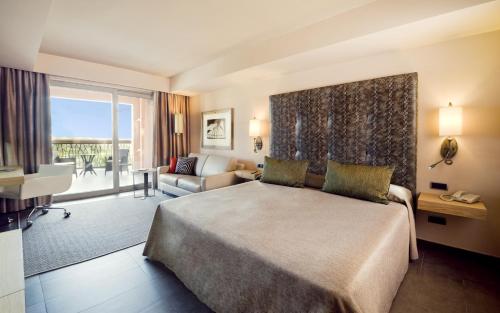 Voodi või voodid majutusasutuse Lopesan Baobab Resort toas