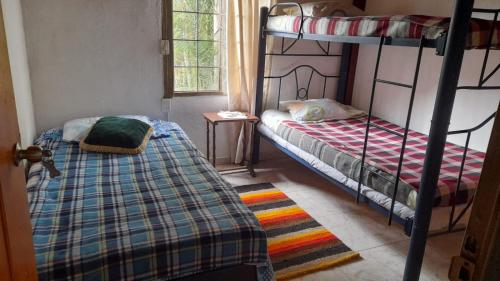 Palanda nebo palandy na pokoji v ubytování Kynza Turismo de Experiencias