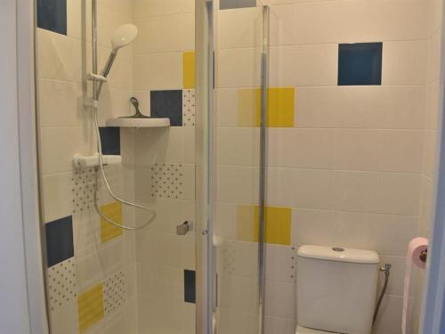 a bathroom with a glass shower with a toilet at Studio ★★★, Climatisé, Wifi, Proche Thermes et Commerces - FR-1-503-140 in Balaruc-les-Bains