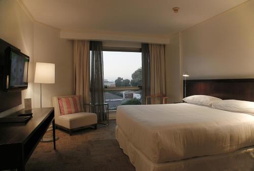 Postel nebo postele na pokoji v ubytování Hotel Costa Real