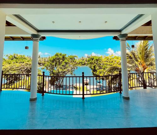 a view from the balcony of a resort at Villa Riverside in Aluthgama