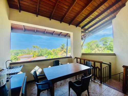 Balkoni atau teres di Hikka Paradise Guest House