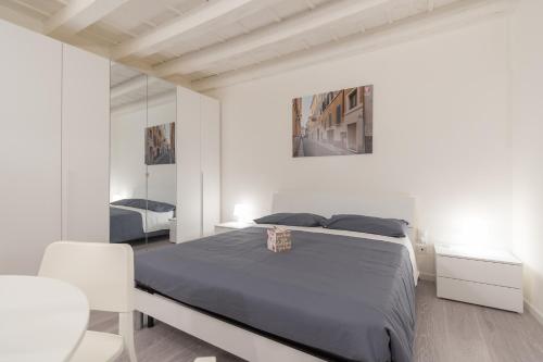 Ένα ή περισσότερα κρεβάτια σε δωμάτιο στο Palazzetto Vittoria - F&L Apartment