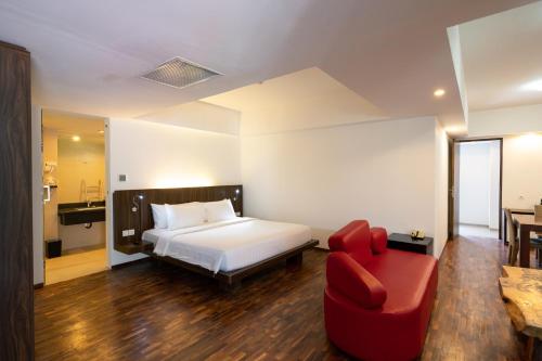 Postel nebo postele na pokoji v ubytování The Bene Hotel