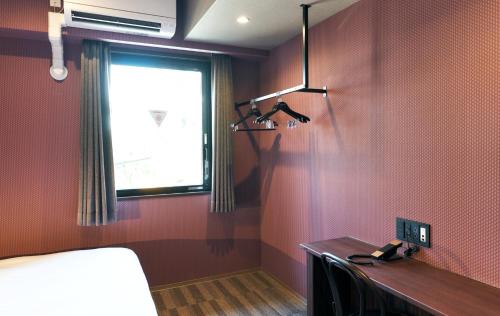 Letto o letti in una camera di Rakuten STAY Kokura Station Standard Twin Room with counter table