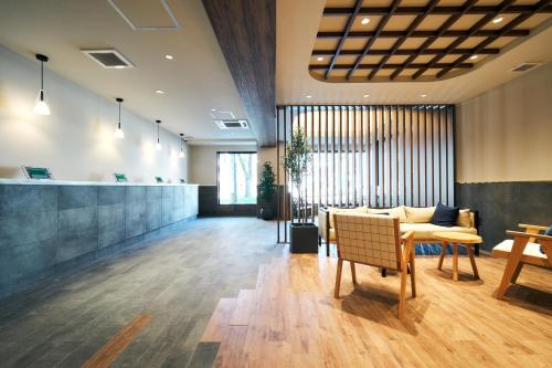 Area soggiorno di Rakuten STAY Kokura Station Family Room
