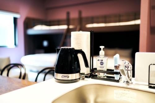 Set per la preparazione di tè e caffè presso Rakuten STAY Kokura Station Family Room