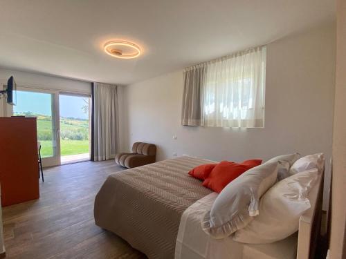 Ένα ή περισσότερα κρεβάτια σε δωμάτιο στο Villa Edelia