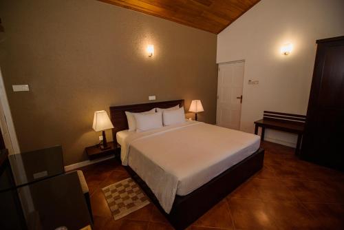 Ein Bett oder Betten in einem Zimmer der Unterkunft Kingsman House