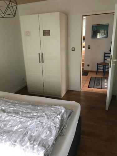 Ένα ή περισσότερα κρεβάτια σε δωμάτιο στο Kuba