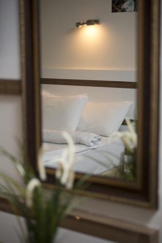 Postel nebo postele na pokoji v ubytování Ceylan Hotel
