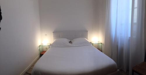 Postel nebo postele na pokoji v ubytování Maison Palm Beach à Cannes