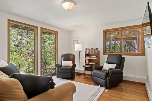 a living room with two chairs and a couch at Nature Stay with Views Like No Where Else in Custer