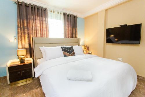Postel nebo postele na pokoji v ubytování Accra Luxury Homes @ Achimota