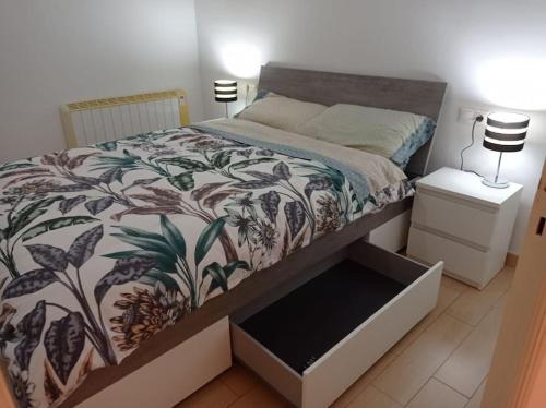 Llit o llits en una habitació de Apartamento 3 habitaciones centro de Torredembarra