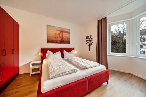 Postel nebo postele na pokoji v ubytování Central Suite Meran