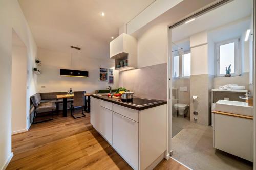 Kuchyň nebo kuchyňský kout v ubytování Central Suite Meran