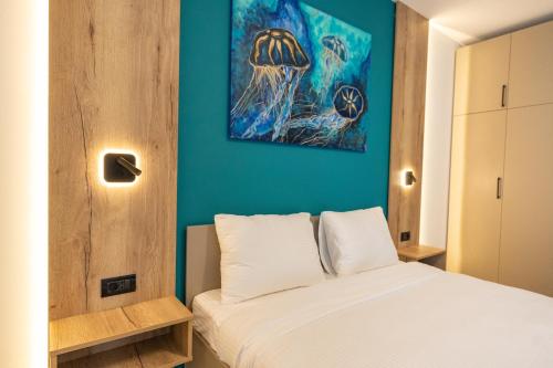 Cama o camas de una habitación en Onda Boutique Hotel