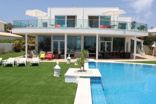 Breathtaking Villa with infinity pool over the sea