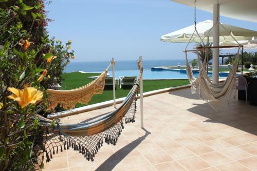 Breathtaking Villa with infinity pool over the sea