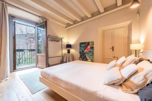 Säng eller sängar i ett rum på Casale Riviera