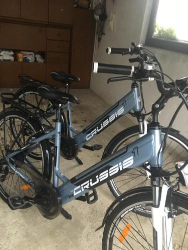 a pair of bikes parked in a room at Holiday Home Mađerka in Štrigova