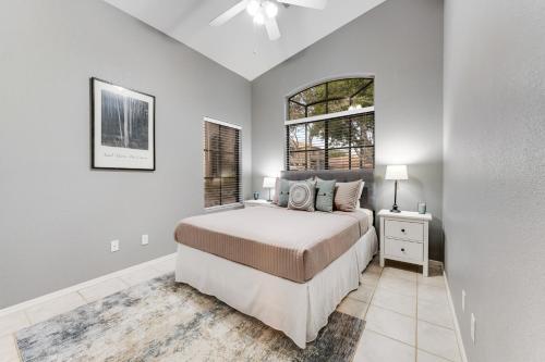 a bedroom with a bed and a window at Hillview Haven in Mesa