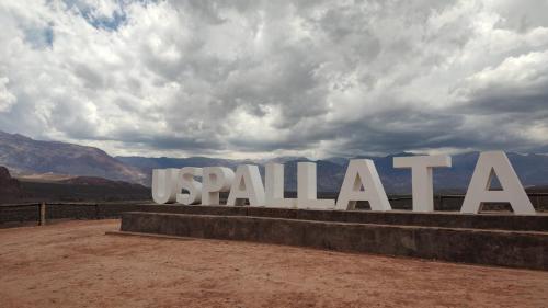 a large sign for the sign for the desert at Nuestra Cabañañá in Uspallata