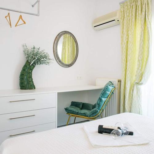 Ένα ή περισσότερα κρεβάτια σε δωμάτιο στο Hotel Papanikolaou