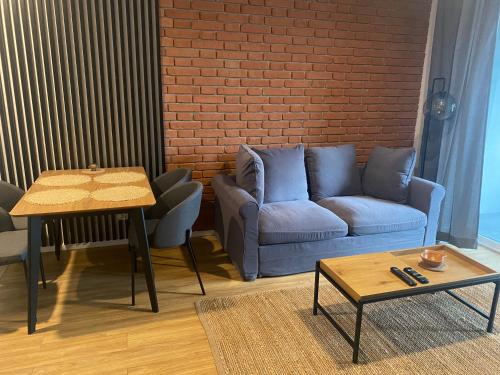 Χώρος καθιστικού στο Apartamenty BRUNO i BIANCA w Symphony Modern Tower Gdynia 2 i 3 piętro