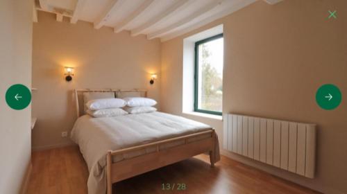 Ένα ή περισσότερα κρεβάτια σε δωμάτιο στο La demeure de Paule