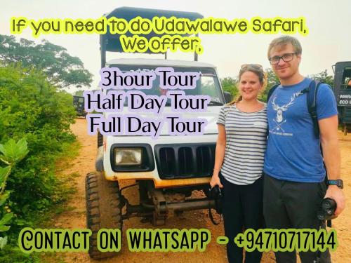 a man and a woman standing next to a jeep at La Casa Safari Resort in Udawalawe