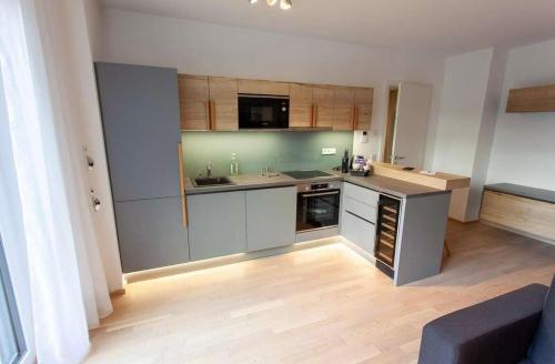 a small kitchen with a counter top and a kitchen at The Room in Regensburg