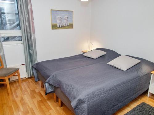 Voodi või voodid majutusasutuse Holiday Home Alppitalo punatähti 7 apt 2 by Interhome toas