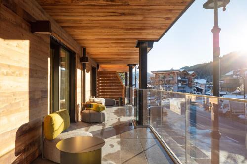 A seating area at Campiglio WOOD