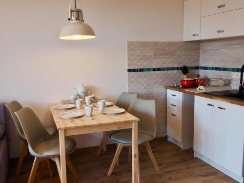 Dapur atau dapur kecil di Bałtyk Apartamenty Poddąbie