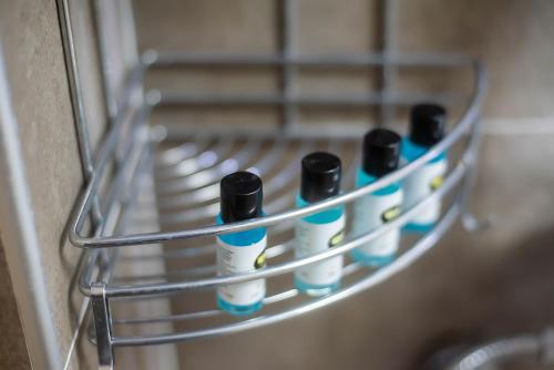 a group of toothbrushes sitting on a rack at LALO Hotel Abastumani in Abastumani
