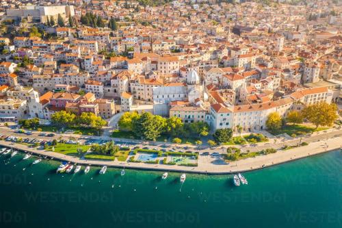 an aerial view of a city with boats in the water at Vila CROATIA in Velika Čista