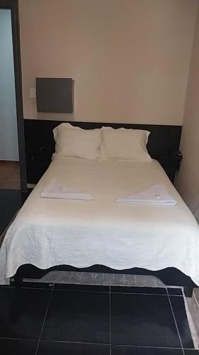 Кровать или кровати в номере HOTEL CRISTAL