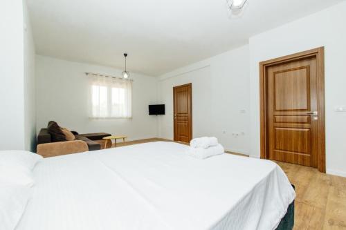Postel nebo postele na pokoji v ubytování Apartments Bojku