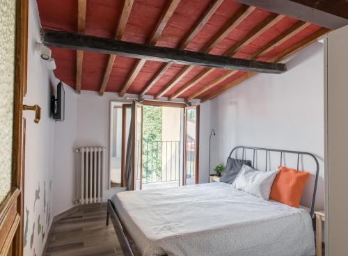 Giường trong phòng chung tại Centrale APT con terrazza a 5min dal Pitti! - HomeUnity