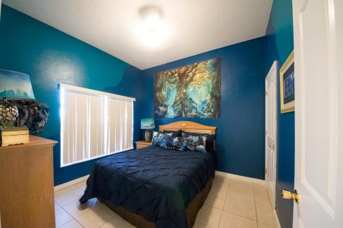 Cama o camas de una habitación en Orlando Vacation Rental Homes