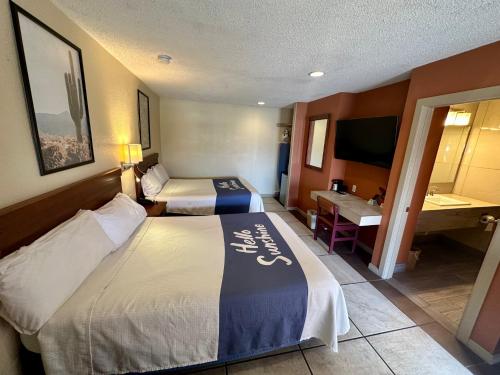 Katil atau katil-katil dalam bilik di Sun Valley Motel Junction