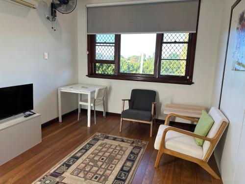 TV o dispositivi per l'intrattenimento presso Parkline Apartments Perth