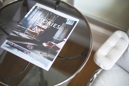 a magazine sitting on top of a glass table at The Arran, St Andrews in St. Andrews