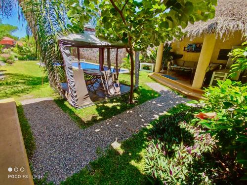 a gazebo in the yard of a house at Villas de Brisas in Cuernavaca