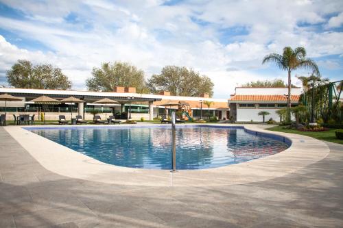 The swimming pool at or close to Hotel Ecce Inn & Spa