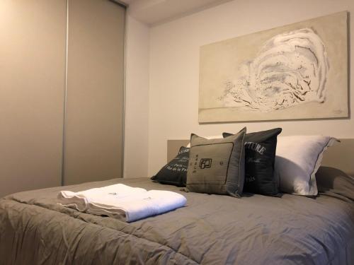 Una cama o camas en una habitación de Usina Studio FMA-Coliving